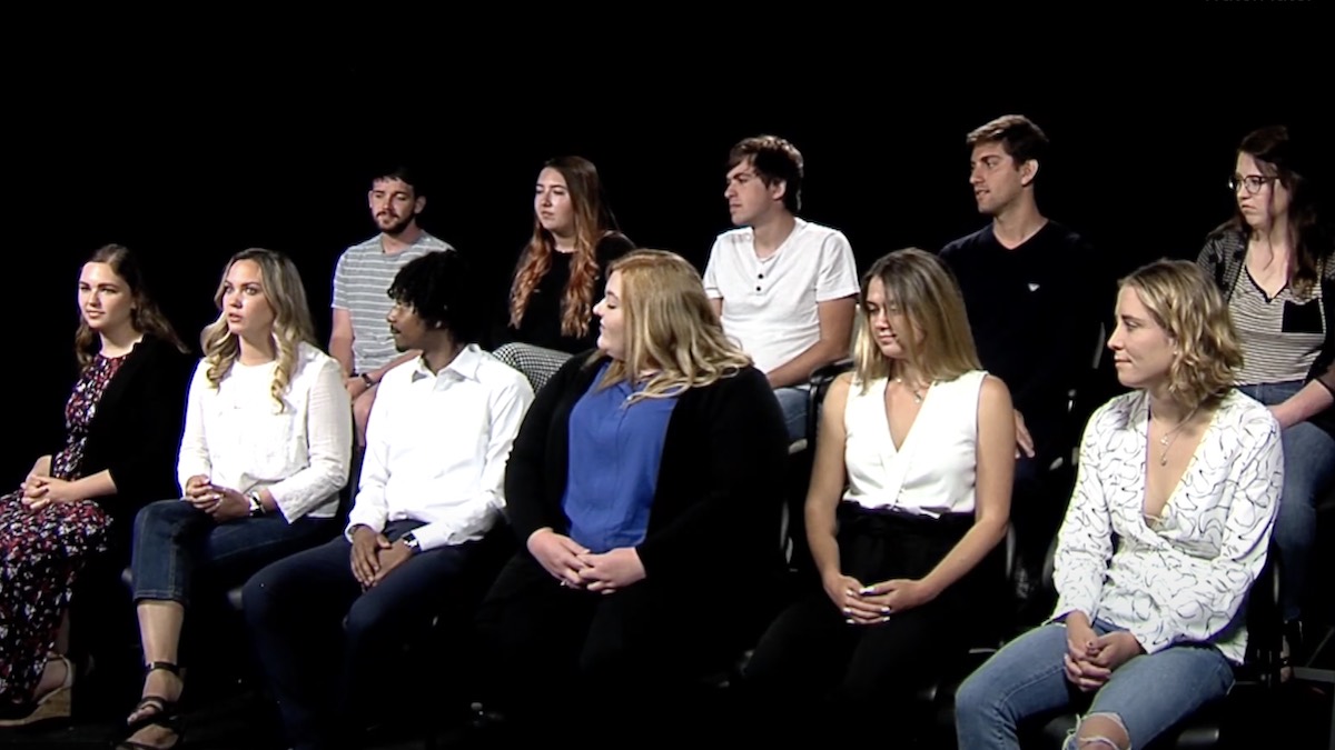All the students seated in a studio and answering questions